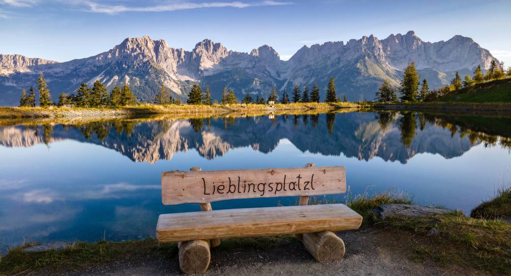 Wooden Bench on the Lakeshore at the Wilder Kaiser