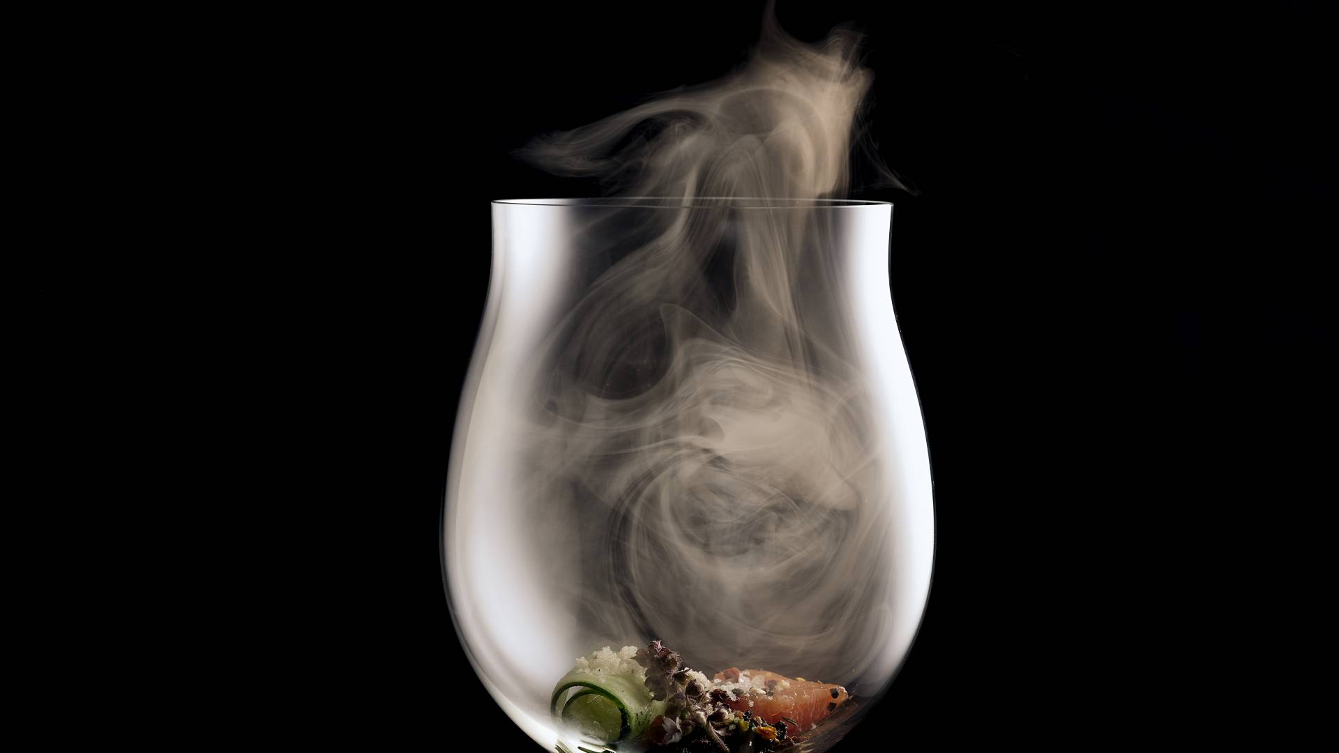  Food with smoke in a wine glass