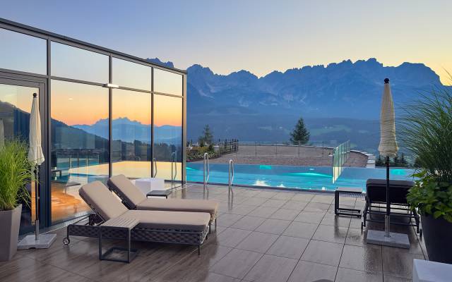 Wellness area with infinity pool and panoramic views of the mountains